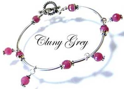 ruby bangle bracelet with charms and sterling silver
