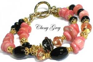 genuine coral bracelet with onyx and gold