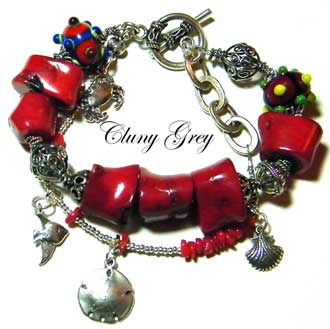 genuine coral bracelet with lampwork and sterling silver