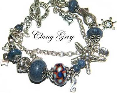 blue coral bracelet with sterling silver chain and charms