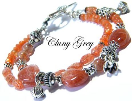 sunstone bracelet with sterling silver charms