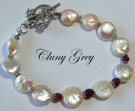 red ruby bracelet with creamy coin pearls and sterling silver