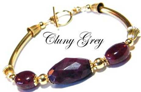 ruby bangle bracelet with gold accents in 14k gold-fill