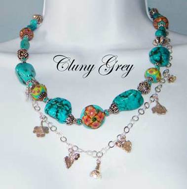 turquoise statement necklace with sterling silver charms