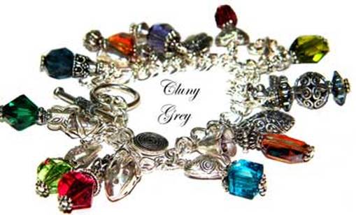 handmade Swarovski crystal bracelet with charms and sterling silver