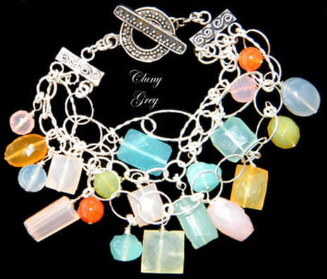 Charm bracelet with chalcedony gemstones and sterling silver.