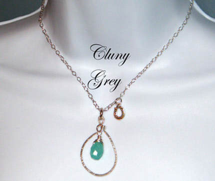 Aqua chalcedony charm necklace.