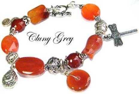 Carnelian bracelet with dragonfly charm and sterling silver.