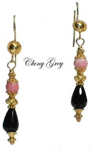 angel skin coral earrings with gold and onyx