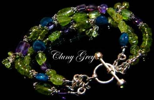 Peridot bracelet of three strands with peacock color apatite, and purple amethyst.